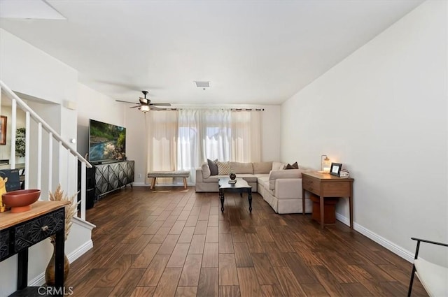 2583 W Fairview Dr, Rialto, CA 92377 - living room with ceiling fan, visible vents, stairway, baseboards, and dark wood-style floors