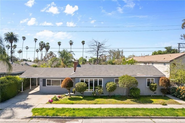 300 Palisade St, Pasadena, CA 91103 - ranch-style home with concrete driveway, stucco siding, and an attached carport