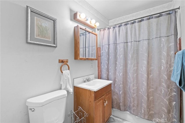 bathroom with toilet, vanity, and shower / tub combo with curtain