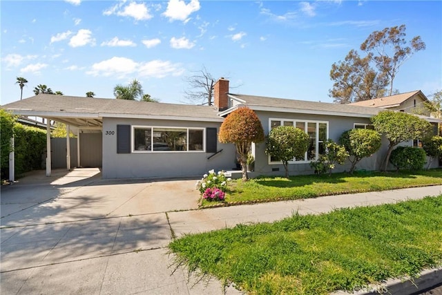 300 Palisade St, Pasadena, CA 91103 - ranch-style home with concrete driveway, an attached carport, a front lawn, stucco siding, and a chimney