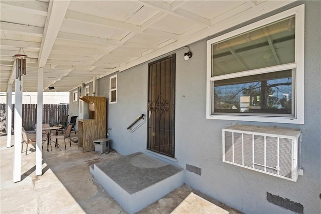 300 Palisade St, Pasadena, CA 91103 - doorway to property with stucco siding and a patio