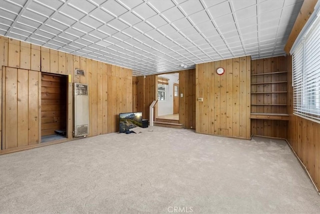 300 Palisade St, Pasadena, CA 91103 - empty room with wood walls and carpet flooring
