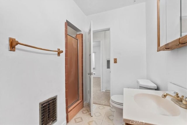 300 Palisade St, Pasadena, CA 91103 - bathroom featuring a shower with shower door, tile patterned flooring, and vanity