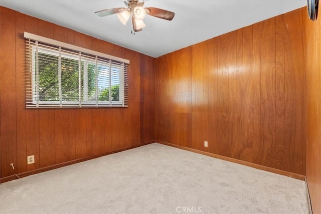 300 Palisade St, Pasadena, CA 91103 - empty room featuring carpet floors, a ceiling fan, and wooden walls
