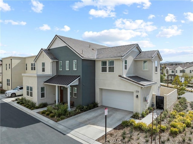 27661 Hillside Pl, Valencia, CA 91381 - multi unit property featuring a residential view, stucco siding, a garage, driveway, and a standing seam roof