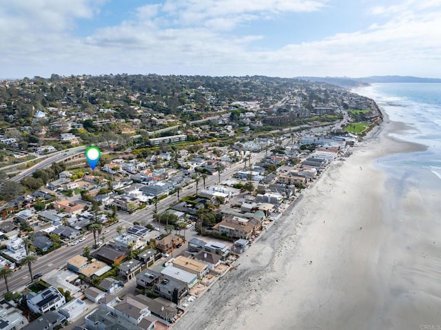 bird's eye view featuring a beach view and a water view