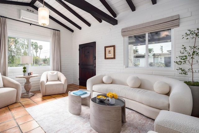 living area featuring lofted ceiling with beams, tile patterned flooring, and wood ceiling