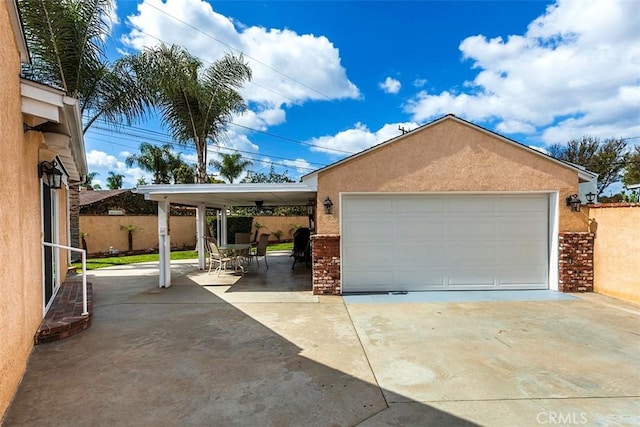 garage featuring fence