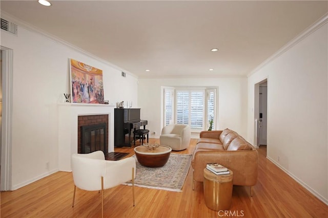 1628 Santa Rosa Ave, Glendale, CA 91208 - living area with baseboards, visible vents, light wood-type flooring, and a brick fireplace