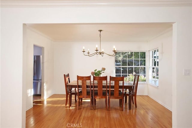 1628 Santa Rosa Ave, Glendale, CA 91208 - dining room featuring an inviting chandelier, crown molding, and light wood-style floors