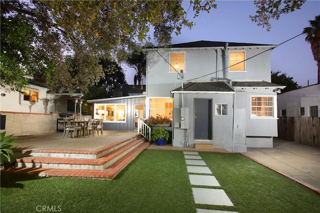 1628 Santa Rosa Ave, Glendale, CA 91208 - rear view of property with fence, stucco siding, and a patio area