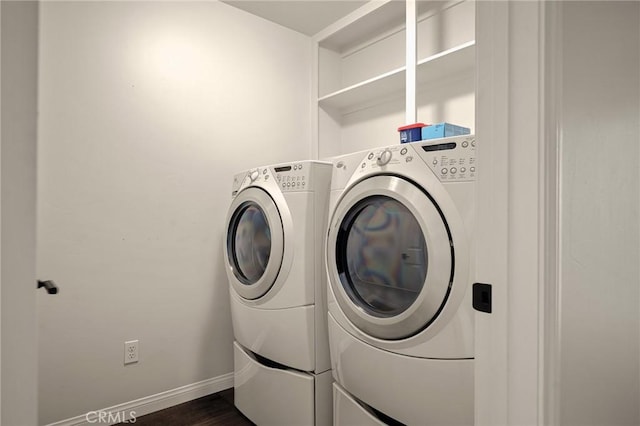 1207 Grass Valley Rd, Lake Arrowhead, CA 92352 - laundry room with washing machine and dryer and dark wood-style flooring