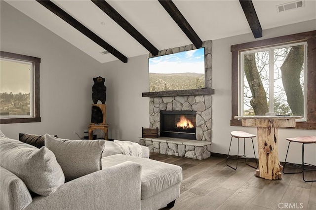 1207 Grass Valley Rd, Lake Arrowhead, CA 92352 - living area featuring wood finished floors, a fireplace, and healthy amount of natural light