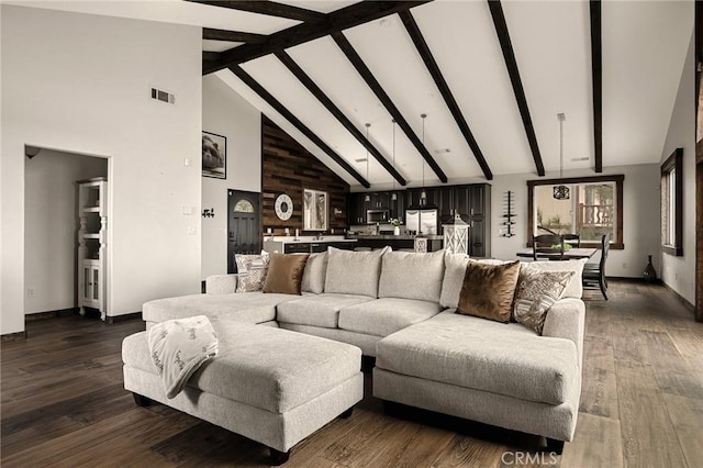 1207 Grass Valley Rd, Lake Arrowhead, CA 92352 - living room with high vaulted ceiling, beamed ceiling, baseboards, and dark wood finished floors