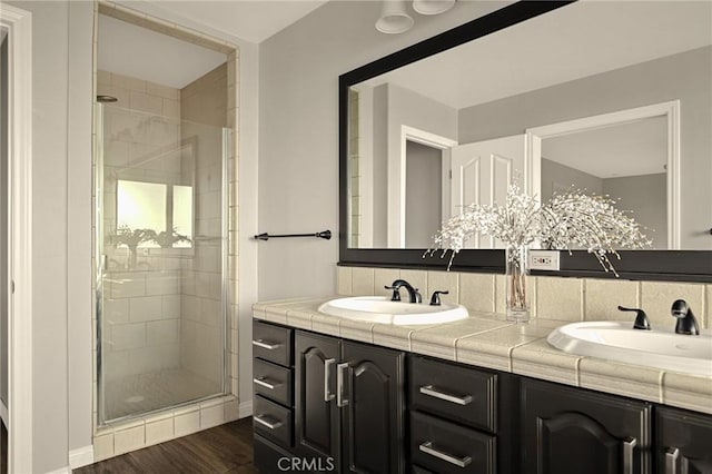 1207 Grass Valley Rd, Lake Arrowhead, CA 92352 - full bath featuring double vanity, a shower stall, and wood finished floors