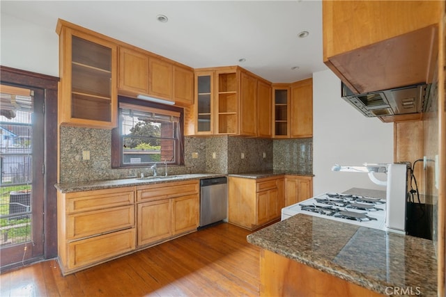 2280 W 24th St, Los Angeles, CA 90018 - kitchen featuring a sink, stainless steel dishwasher, glass insert cabinets, hardwood / wood-style floors, and dark stone counters