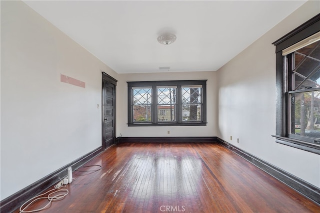2280 W 24th St, Los Angeles, CA 90018 - unfurnished room featuring baseboards and wood-type flooring