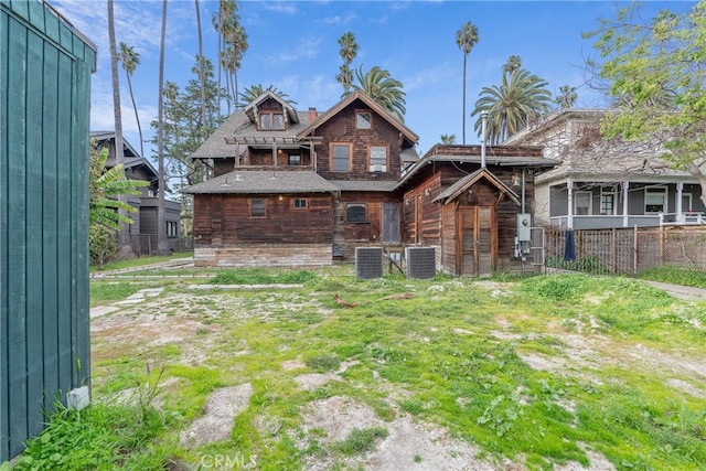 2280 W 24th St, Los Angeles, CA 90018 - rear view of house with central air condition unit and fence