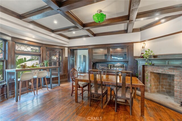 2280 W 24th St, Los Angeles, CA 90018 - dining area featuring wood-type flooring, coffered ceiling, and beam ceiling