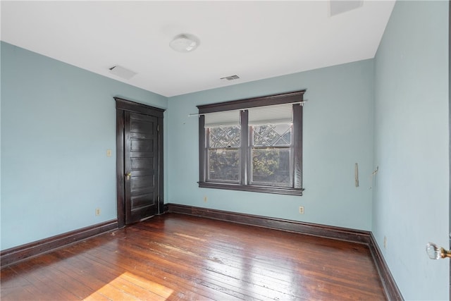 2280 W 24th St, Los Angeles, CA 90018 - spare room featuring baseboards, visible vents, and wood-type flooring