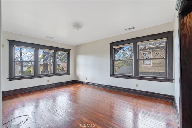 2280 W 24th St, Los Angeles, CA 90018 - spare room with wood-type flooring, baseboards, and visible vents
