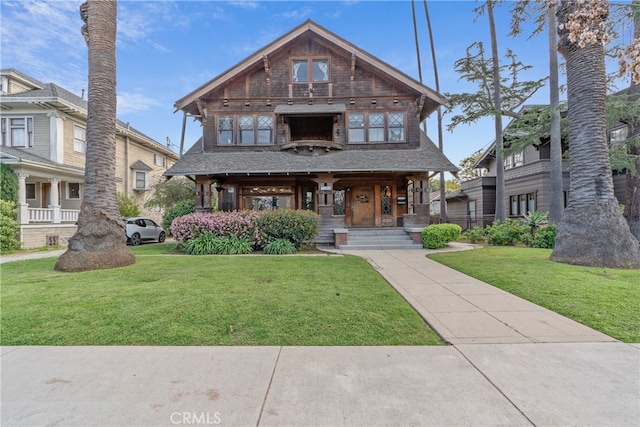 2280 W 24th St, Los Angeles, CA 90018 - view of front of property featuring covered porch and a front lawn
