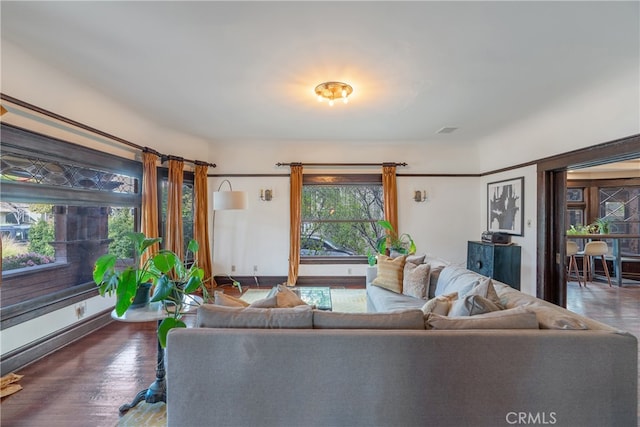 2280 W 24th St, Los Angeles, CA 90018 - living room with baseboards, visible vents, and wood finished floors