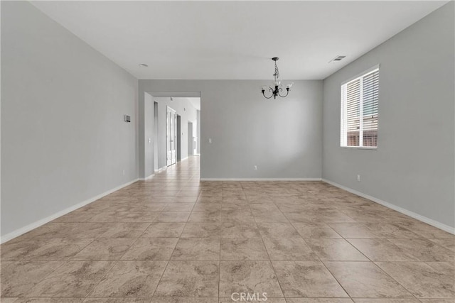 13204 Monrovia St, Hesperia, CA 92344 - spare room featuring baseboards, light tile patterned flooring, visible vents, and a notable chandelier