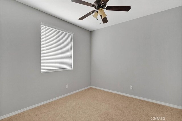 13204 Monrovia St, Hesperia, CA 92344 - spare room featuring baseboards, light colored carpet, and ceiling fan