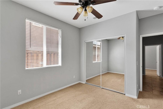 13204 Monrovia St, Hesperia, CA 92344 - unfurnished bedroom with a closet, carpet floors, baseboards, and multiple windows