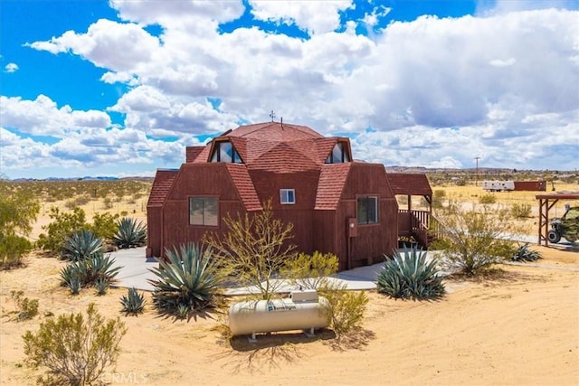 951 N Kuna Ave, Landers, CA 92285 - view of side of home featuring a shingled roof