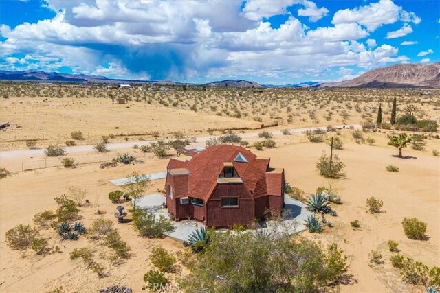 951 N Kuna Ave, Landers, CA 92285 - aerial view of sparsely populated area with a desert landscape and a mountainous background