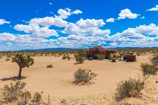951 N Kuna Ave, Landers, CA 92285 - view of mountain backdrop featuring rural landscape