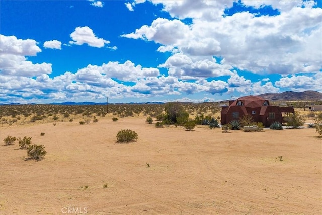 951 N Kuna Ave, Landers, CA 92285 - view of mountain backdrop featuring rural landscape