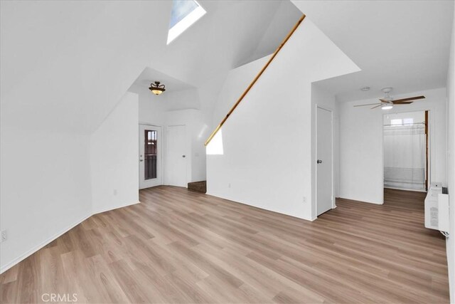 951 N Kuna Ave, Landers, CA 92285 - unfurnished living room featuring light wood-style floors and ceiling fan