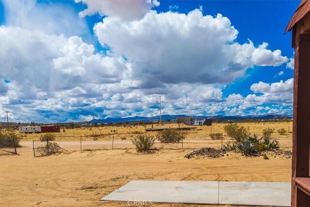 951 N Kuna Ave, Landers, CA 92285 - view of yard featuring fence and a rural view