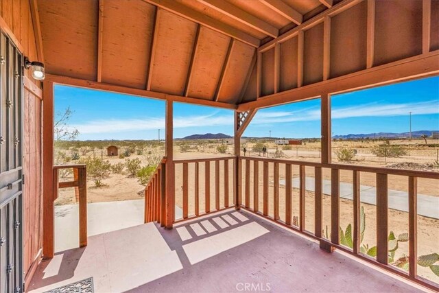 951 N Kuna Ave, Landers, CA 92285 - view of patio featuring a mountain view and a rural view