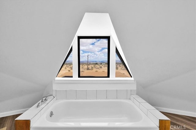 951 N Kuna Ave, Landers, CA 92285 - bathroom with a bath and wood finished floors