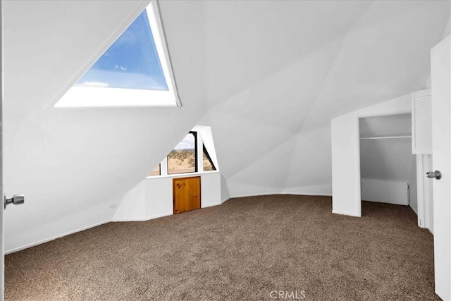 951 N Kuna Ave, Landers, CA 92285 - additional living space with carpet floors and vaulted ceiling