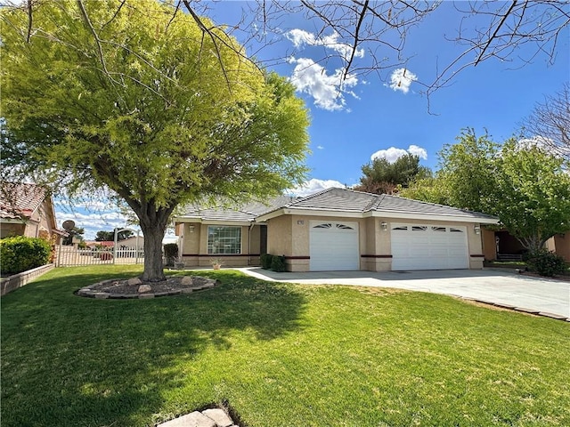 27813 Hummingbird Ln, Helendale, CA 92342 - ranch-style house with fence, a garage, concrete driveway, a front yard, and stucco siding