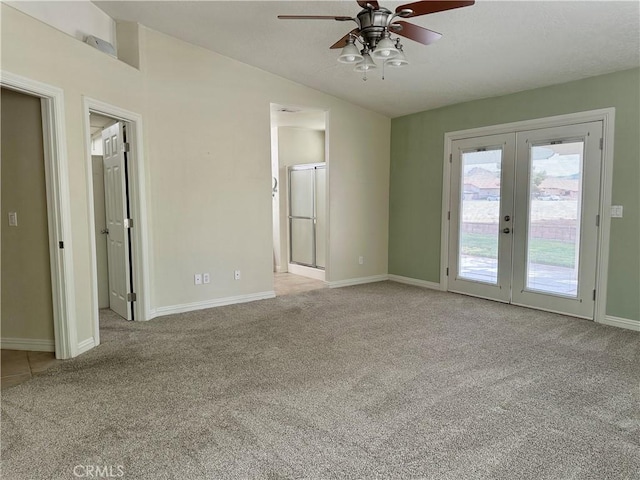 27813 Hummingbird Ln, Helendale, CA 92342 - interior space with french doors, baseboards, access to exterior, a ceiling fan, and light carpet