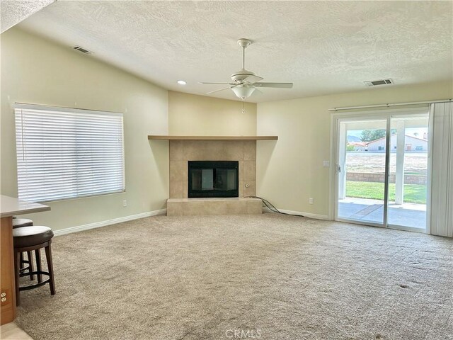 27813 Hummingbird Ln, Helendale, CA 92342 - carpeted living area with baseboards, visible vents, and a ceiling fan