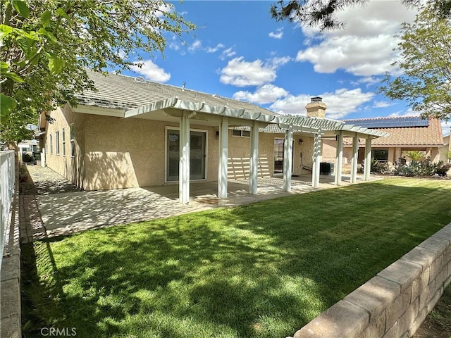 27813 Hummingbird Ln, Helendale, CA 92342 - rear view of property with stucco siding, fence, a patio, a pergola, and a yard