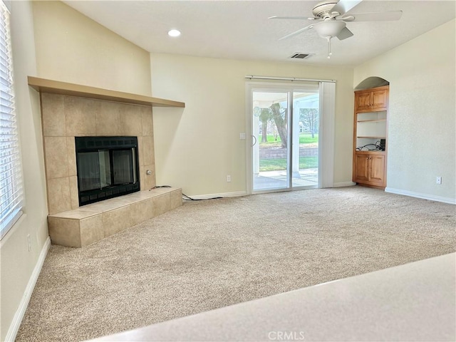 27813 Hummingbird Ln, Helendale, CA 92342 - unfurnished living room with ceiling fan, baseboards, light colored carpet, and visible vents