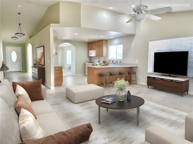 27813 Hummingbird Ln, Helendale, CA 92342 - living area featuring recessed lighting, high vaulted ceiling, baseboards, arched walkways, and ceiling fan