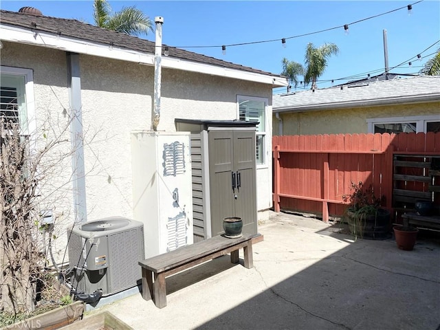 258 17th St, Seal Beach, CA 90740 - view of patio / terrace featuring cooling unit and fence