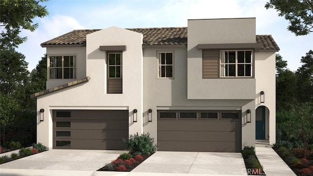 view of front of property featuring driveway, stucco siding, a tile roof, and a garage