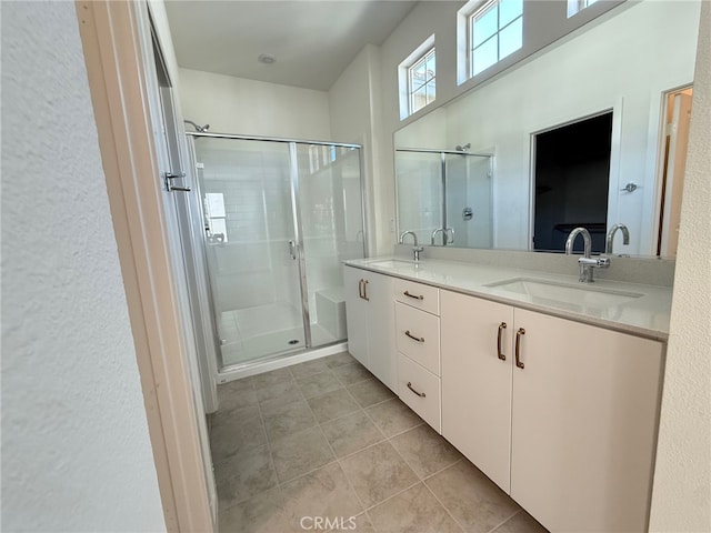 15903 Blue Copper Way, Fontana, CA 92336 - full bath with a shower stall, double vanity, and tile patterned floors
