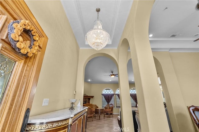 1403 Sonora St, San Bernardino, CA 92404 - interior space featuring visible vents, ornamental molding, a notable chandelier, arched walkways, and light tile patterned floors
