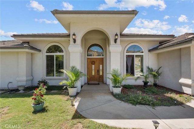 1403 Sonora St, San Bernardino, CA 92404 - entrance to property with stucco siding and a lawn